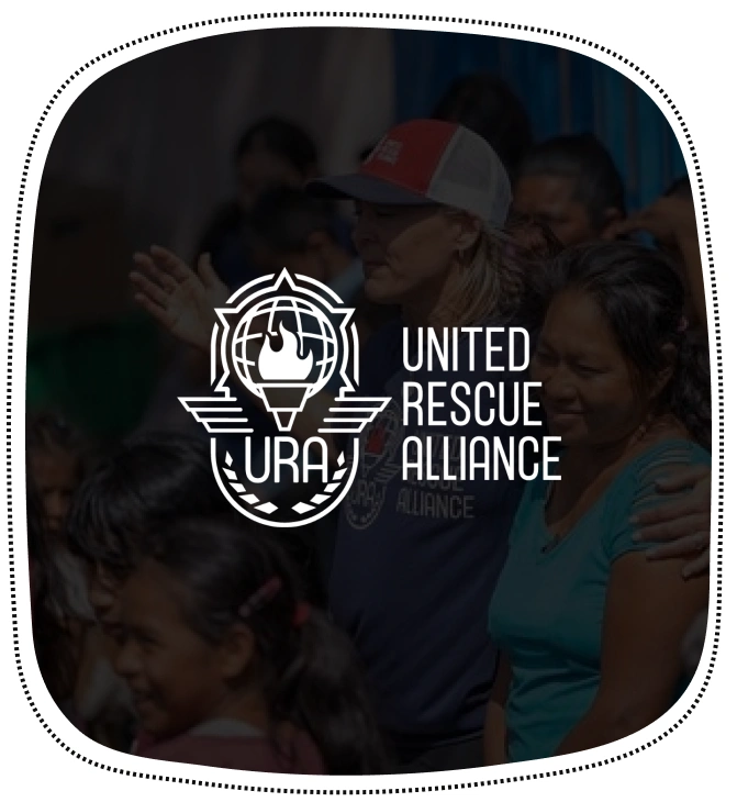 United Rescue Alliance logo overlaid on group of people in casual setting.