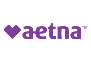 Aetna logo featuring purple heart symbol and company name text.