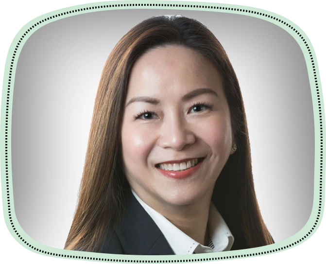 Professional headshot of an Asian woman smiling in business attire against neutral background.